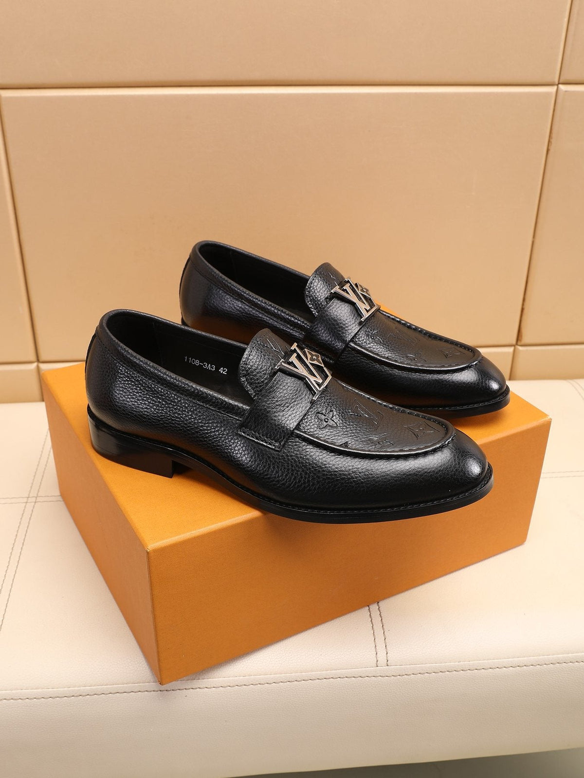 Louis Vuitton Black Embossed Loafers — front
