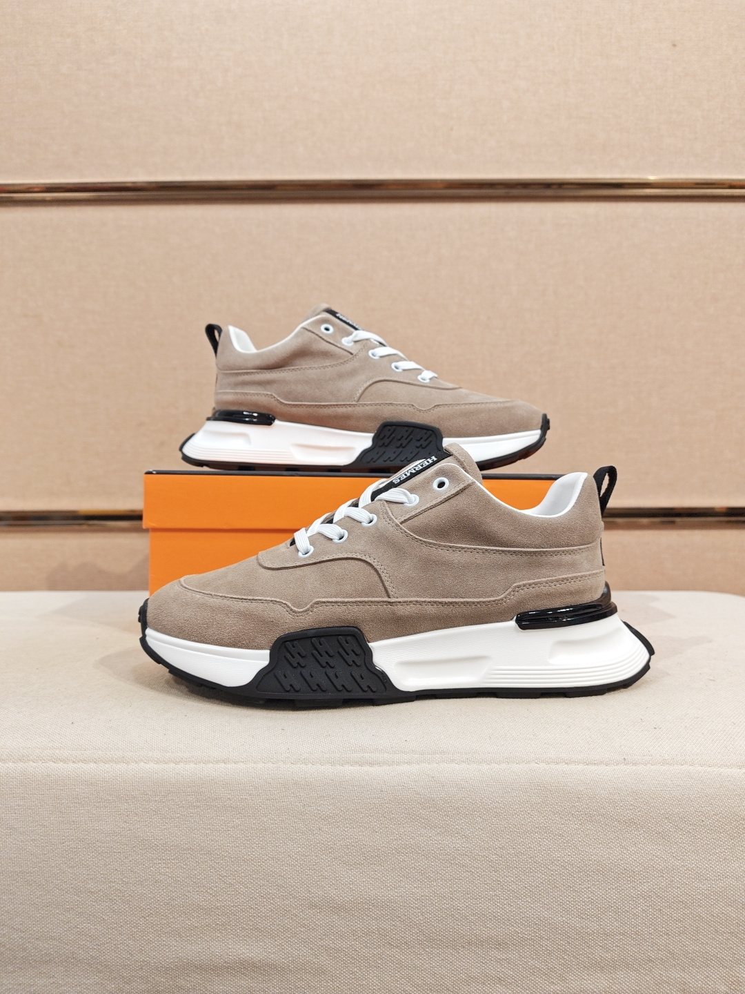 Hermès Lace-Up Sculpted-Sole Sneakers — side