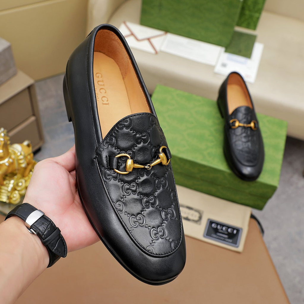 Gucci Black Embossed Loafers — model